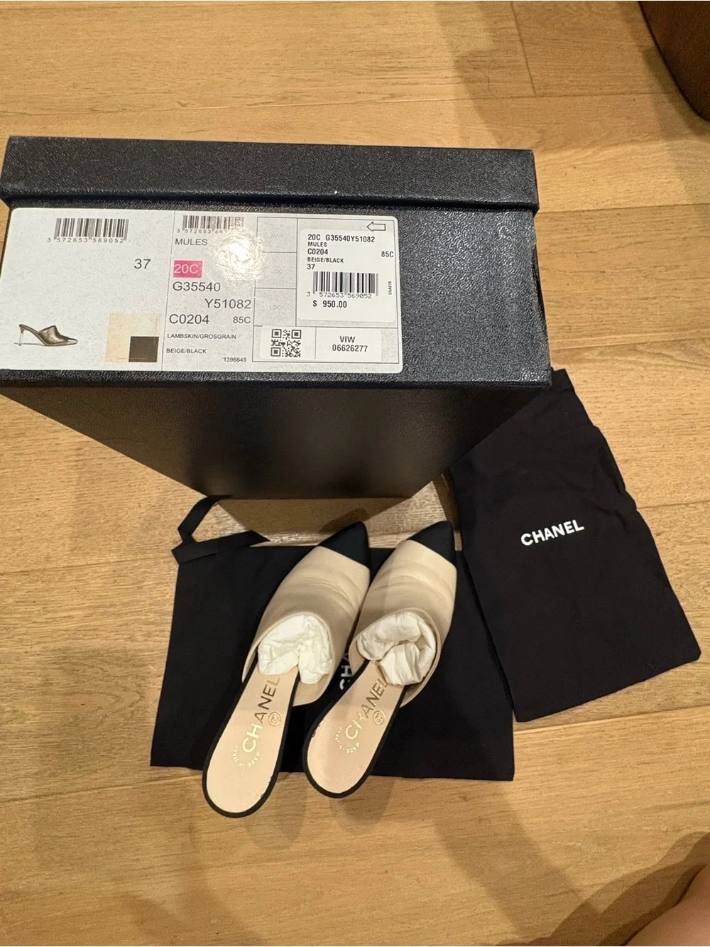 CHANEL Two-Tone Leather Mules with Pearl-Embellished Heel in White & Black